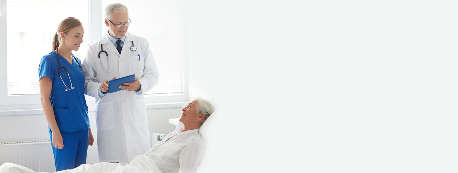 Compassionate doctor caring for a patient at J S Hospital